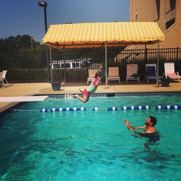 Brian catching Emily at the pool