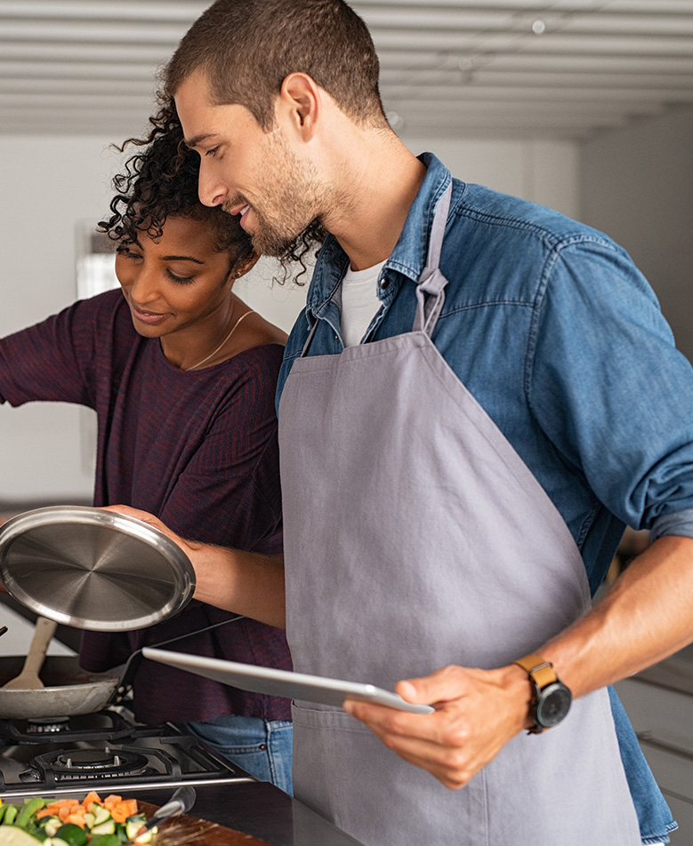 couple cooking dinner together