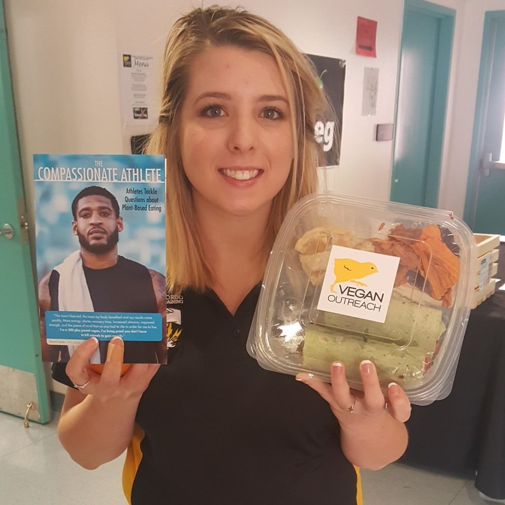 Attendee with lunch and leaflet